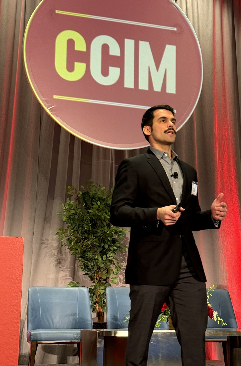 Topher Stephenson on stage at CCIM